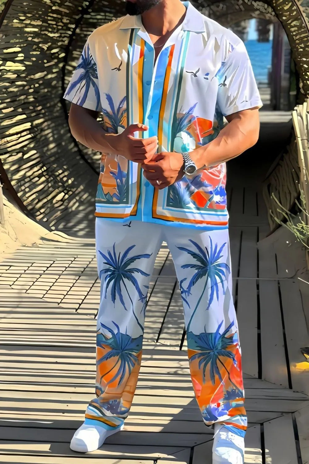 Men's full-size printed short sleeve top and pants set in vibrant colors, featuring palm tree design.