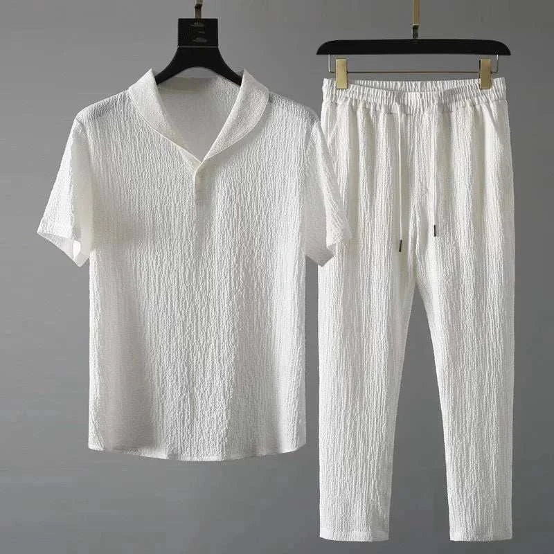 Summer Men Vacation set in white with v-neck, short sleeves, and drawstring pants.