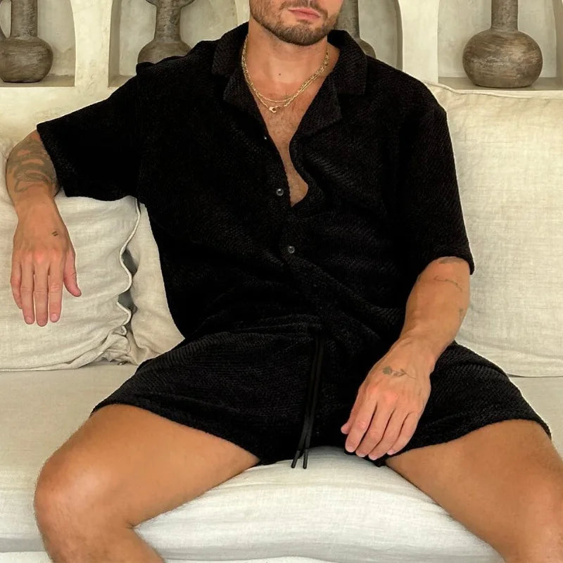 Luxury men beach wear set with short sleeves in black, featuring solid pattern and drawstring pants for casual style.