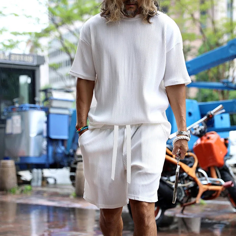 Men's vacation loose beach shorts set for stylish comfort.