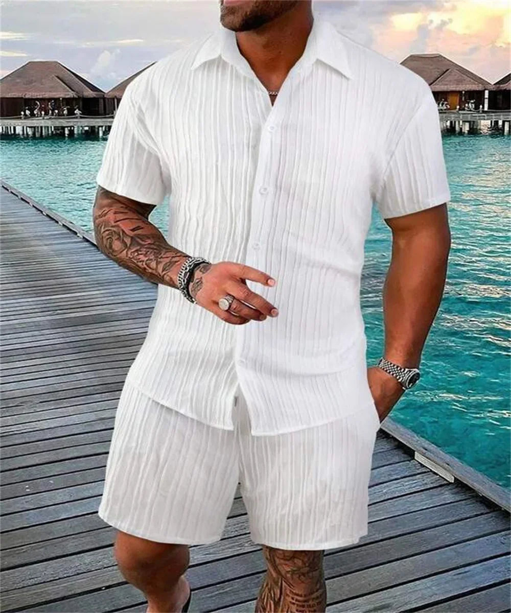 Irie men beach shorts set in white by the ocean, featuring a breathable and stylish design.