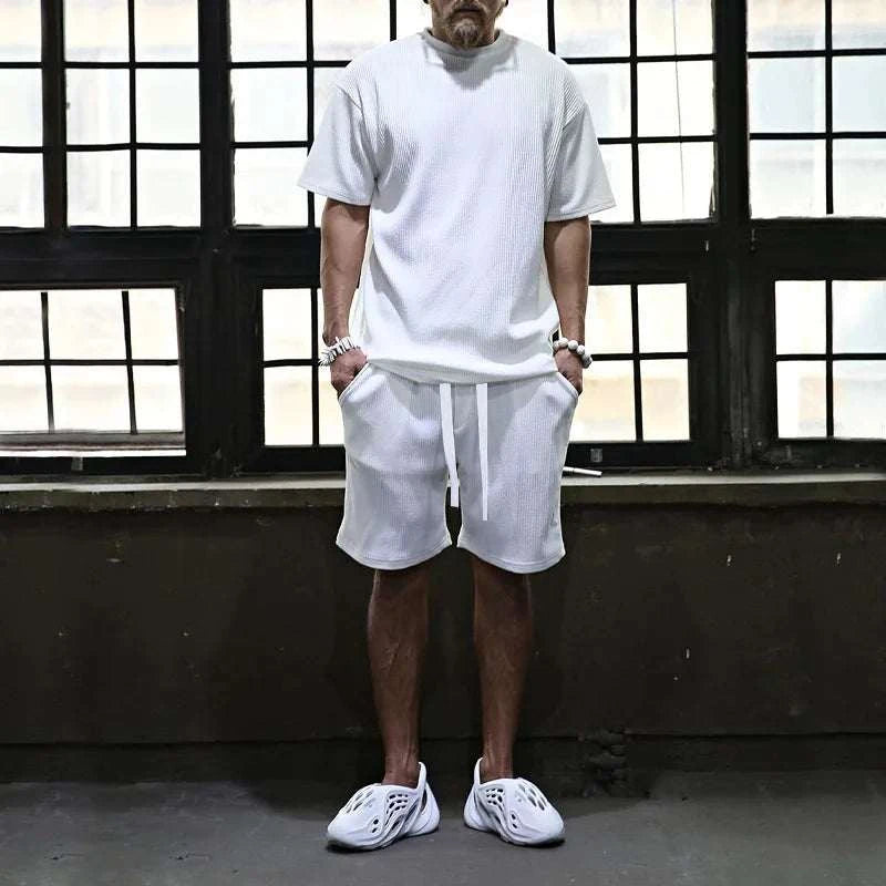 Men's Vacation Loose Beach Shorts Set, comfortable and stylish for beach adventures.
