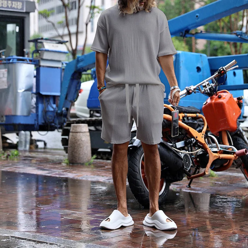 Men's Vacation Loose Beach Shorts Set with Stylish Top for Beach Adventures.