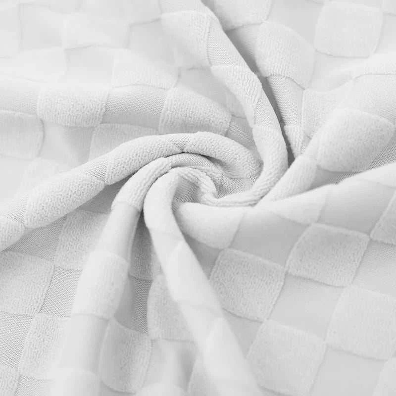 Men's leisure oversized shorts set in light gray checkered polyester fabric.