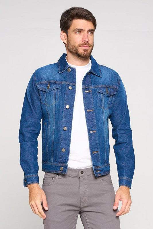 Men's Denim Jacket in blue, 100% cotton, modeled by a man wearing a white shirt and gray pants.