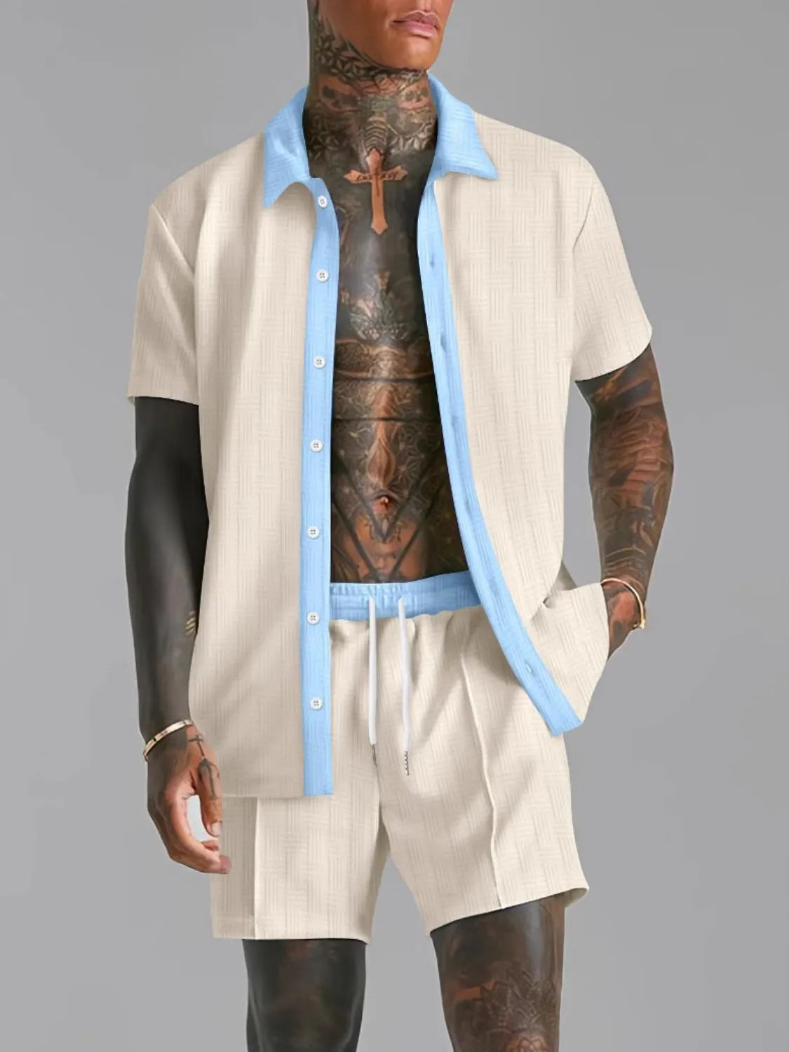 Men's full size collared neck short sleeve top and shorts set in beige with blue accents.