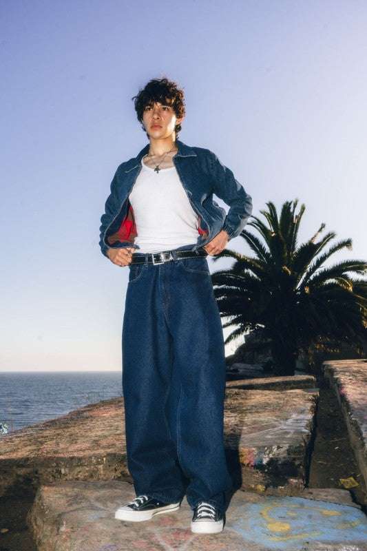 Men's denim baggy fit jeans styled for a relaxed, casual look with a wide leg opening and classic design.
