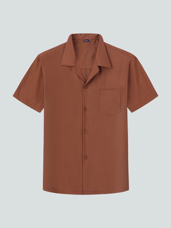 Loose-fit solid color casual lapel short sleeve shirt for men, ideal for spring-summer outings.