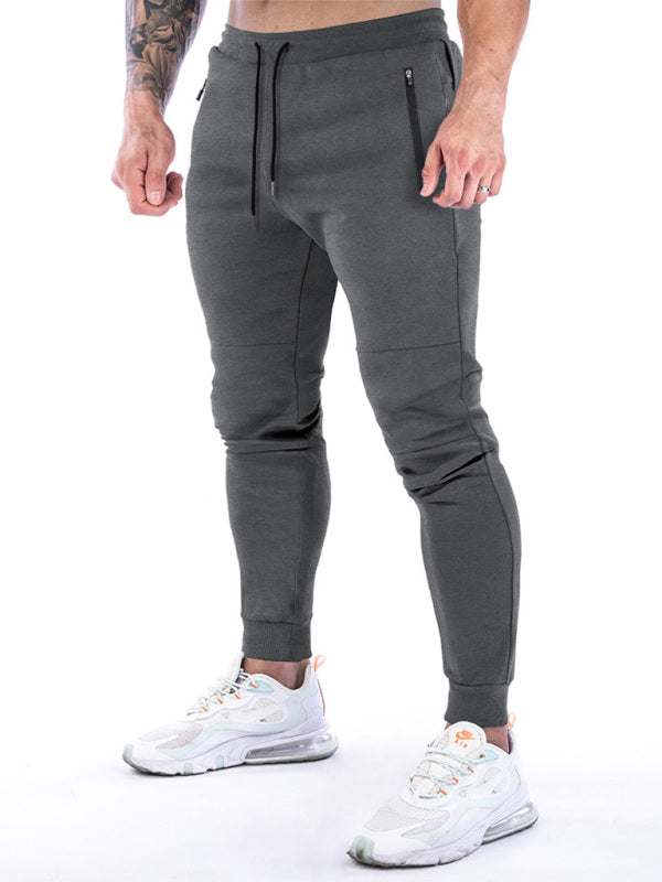 Men's versatile fitness training pants with back towel hold, premium material, and practical design.