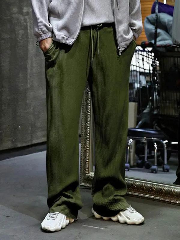 High-waisted wide-leg striped trousers for men with comfort fit and practical pockets.