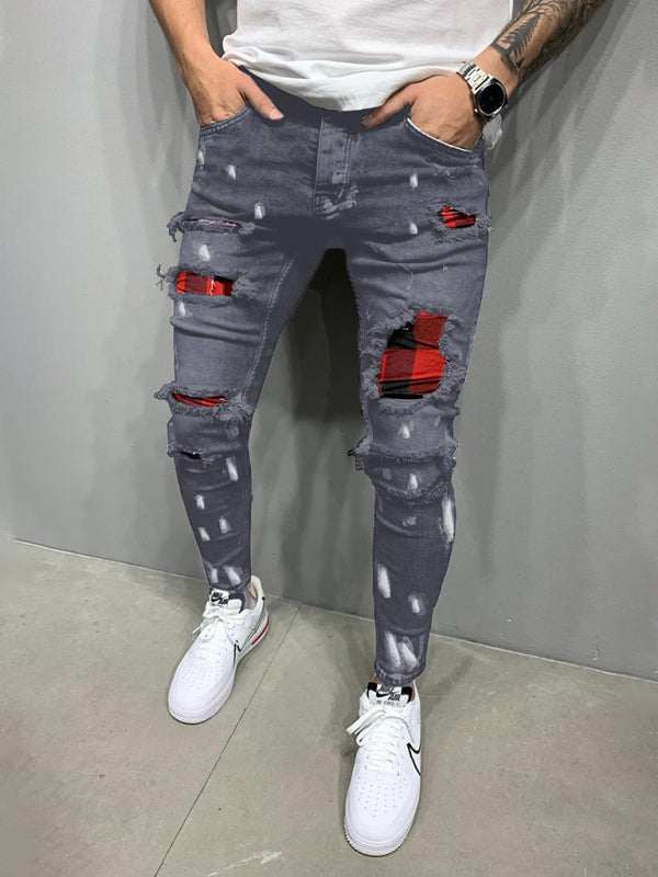Distressed denim jeans with slant pockets and slight elastic cotton blend for comfort.