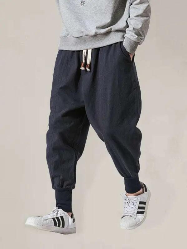 Chic linen hip hop breathable cotton trousers in solid color for men.