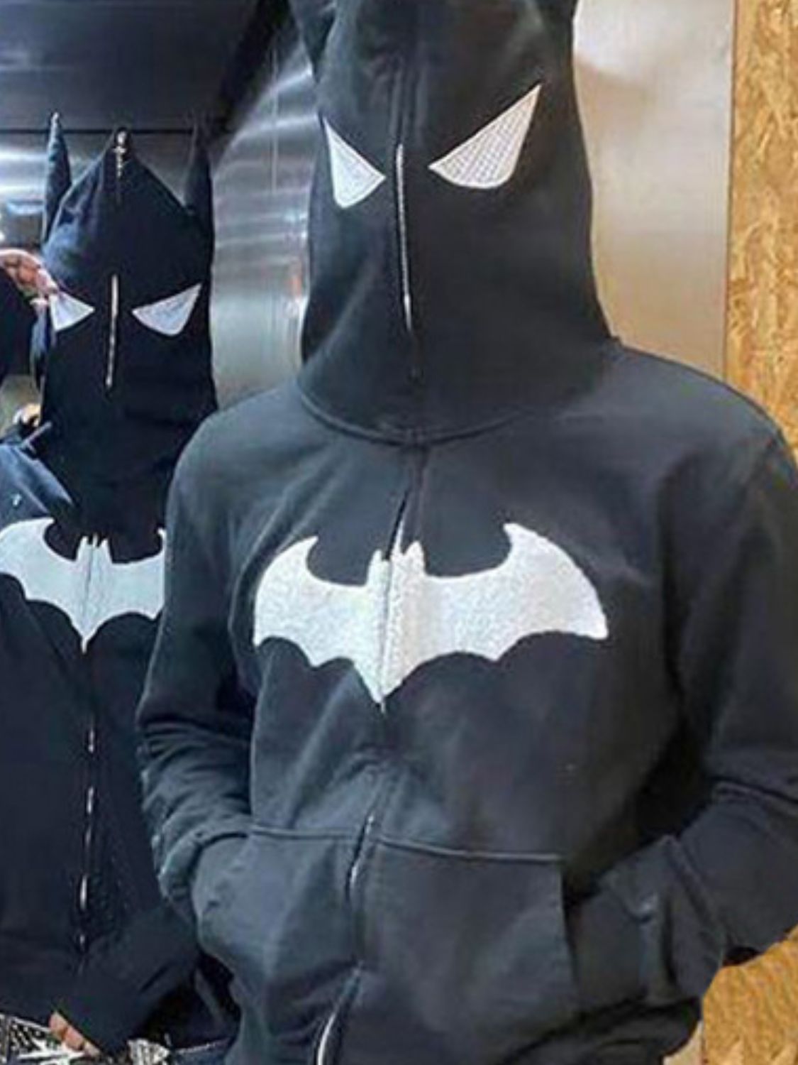 Men's bat embroidered zip-up hoodie with pockets and slightly stretchy material.