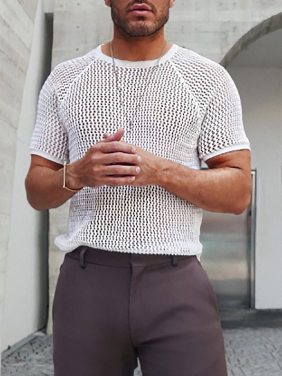 Men's openwork round neck short sleeve t-shirt with moderate stretch in white.