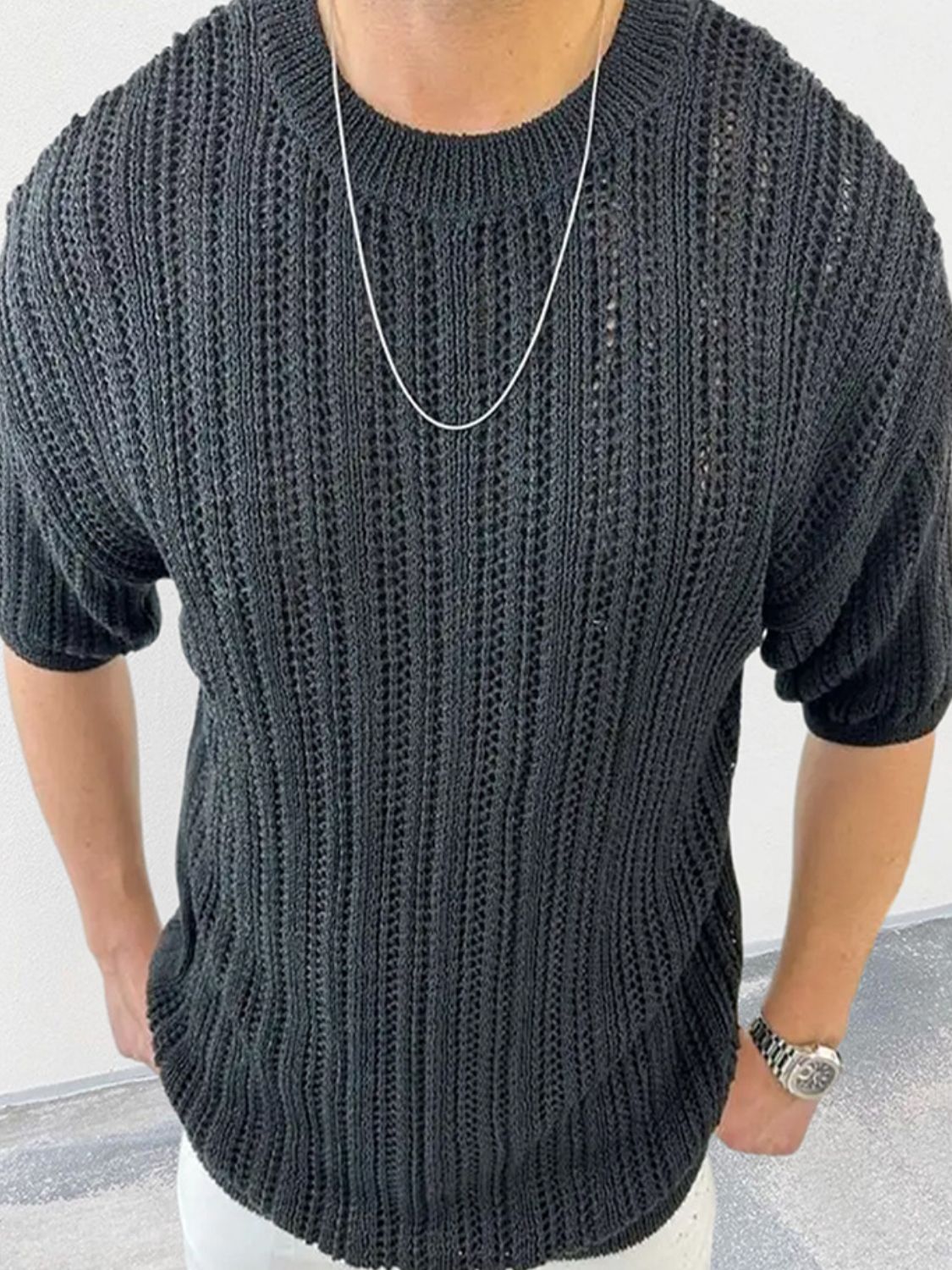 Men's Openwork Round Neck Knit T-Shirt in black, showcasing lightweight and breathable knit design.