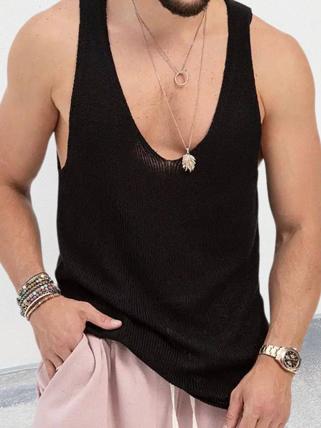 Men's scoop neck knit tank in black, basic style, moderate stretch, 95% acrylic, 5% polyester.