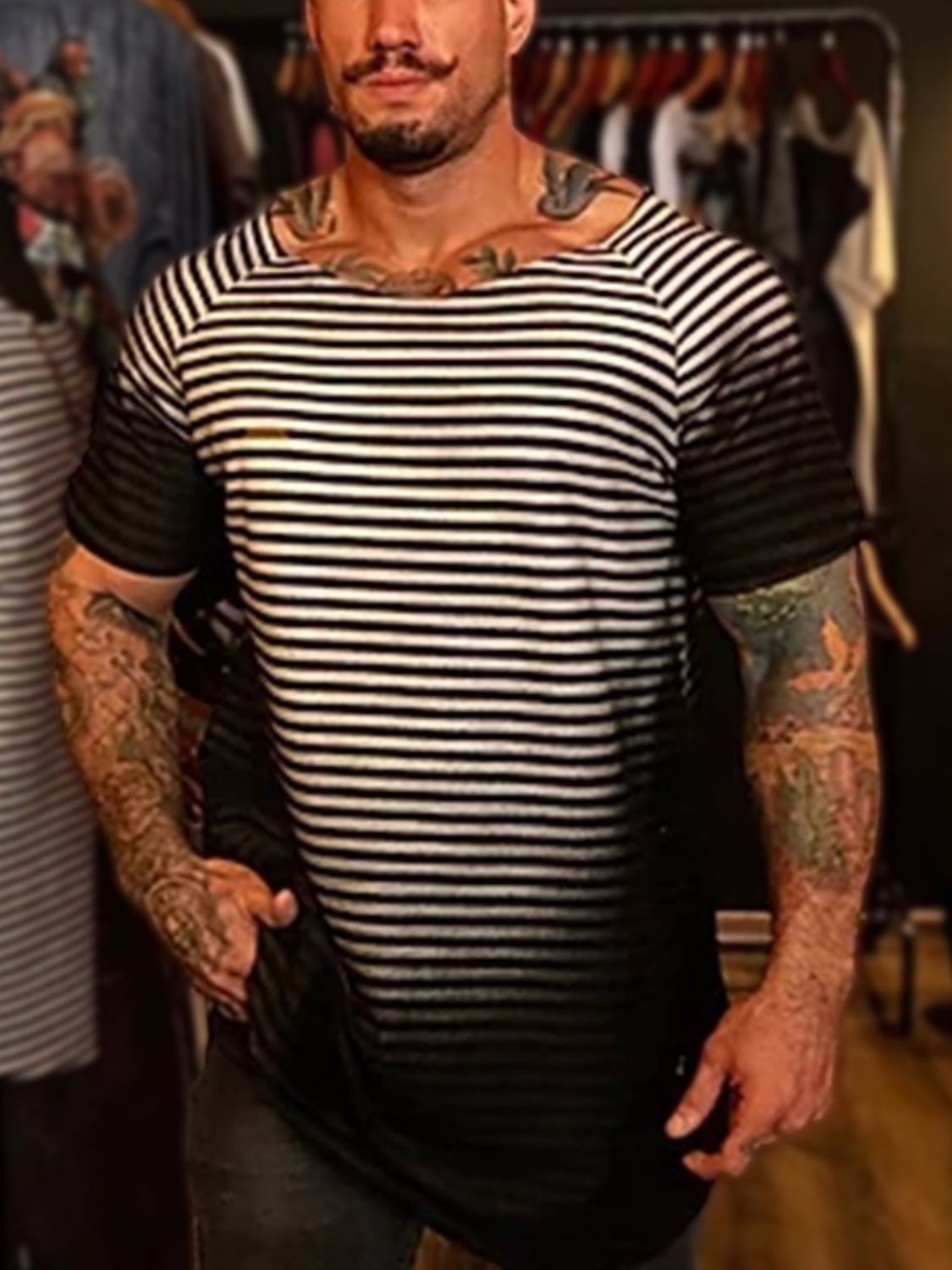 Men's full size round neck striped T-shirt, short sleeve, black and white design.