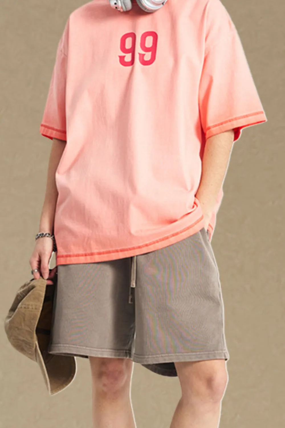 Men's round neck half sleeve T-shirt with number design in pink.