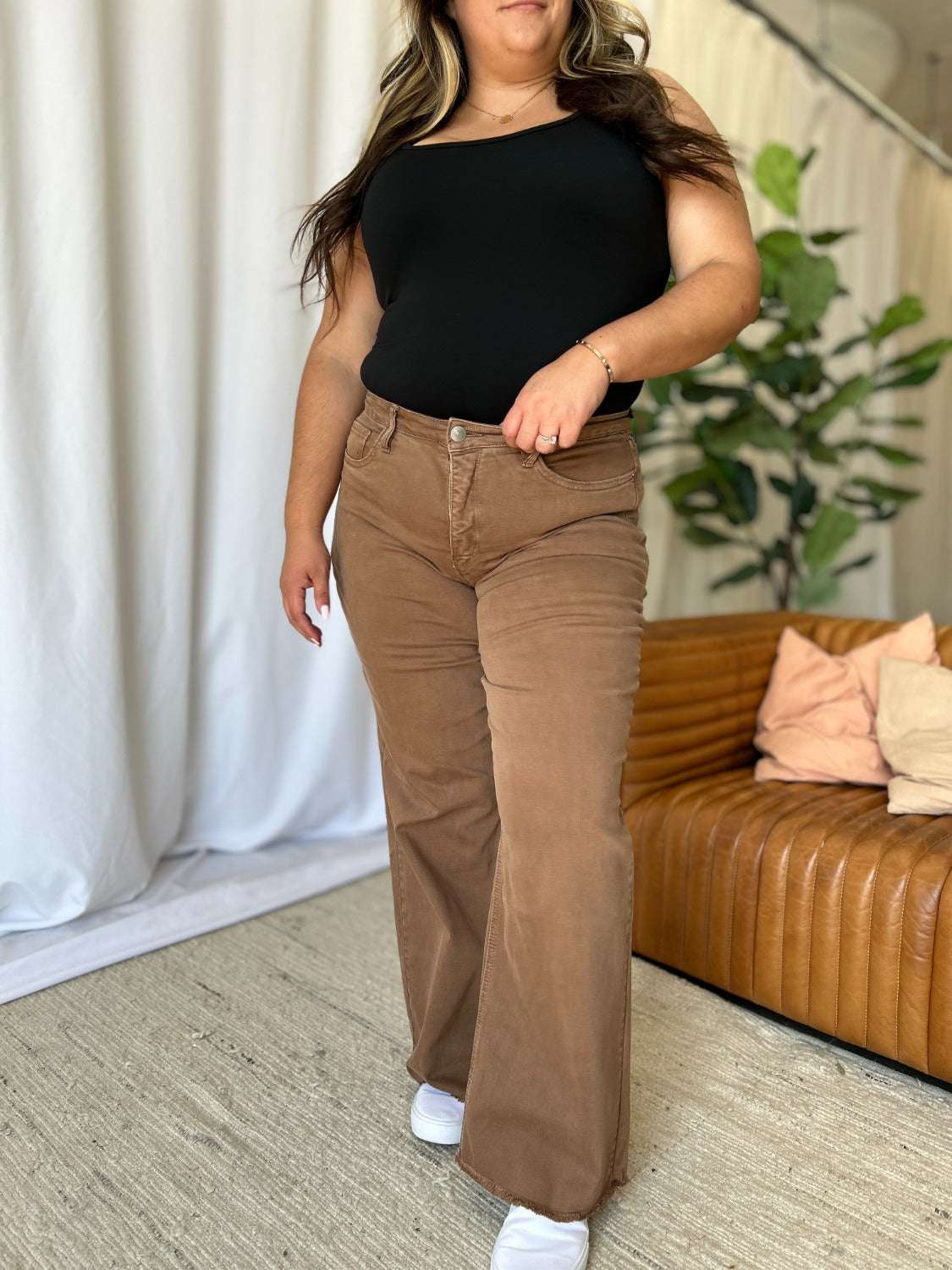 Wide leg high rise jeans with rich garment dye color and a comfortable, flattering fit.