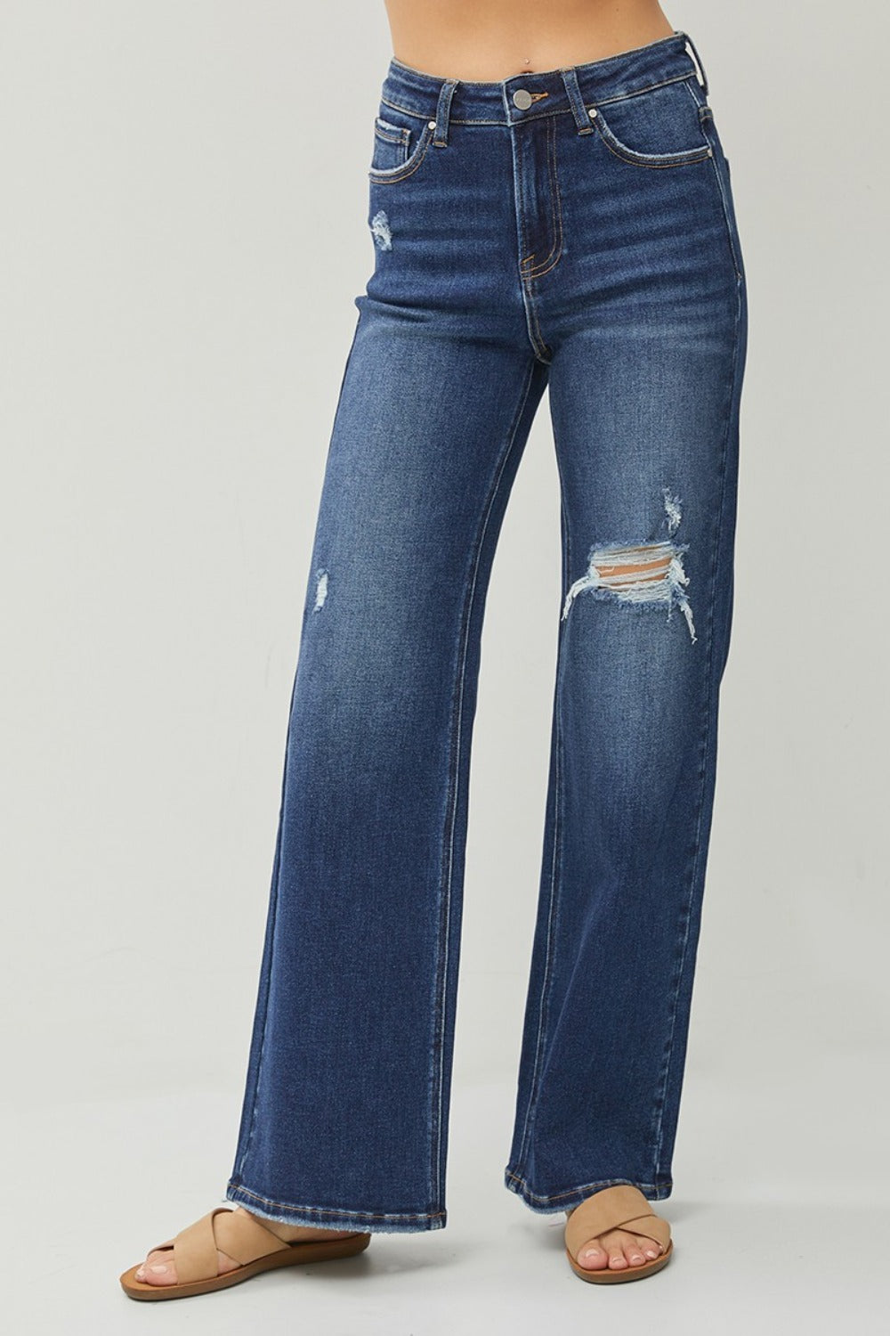 Full size high rise distressed wide leg jeans with pockets.