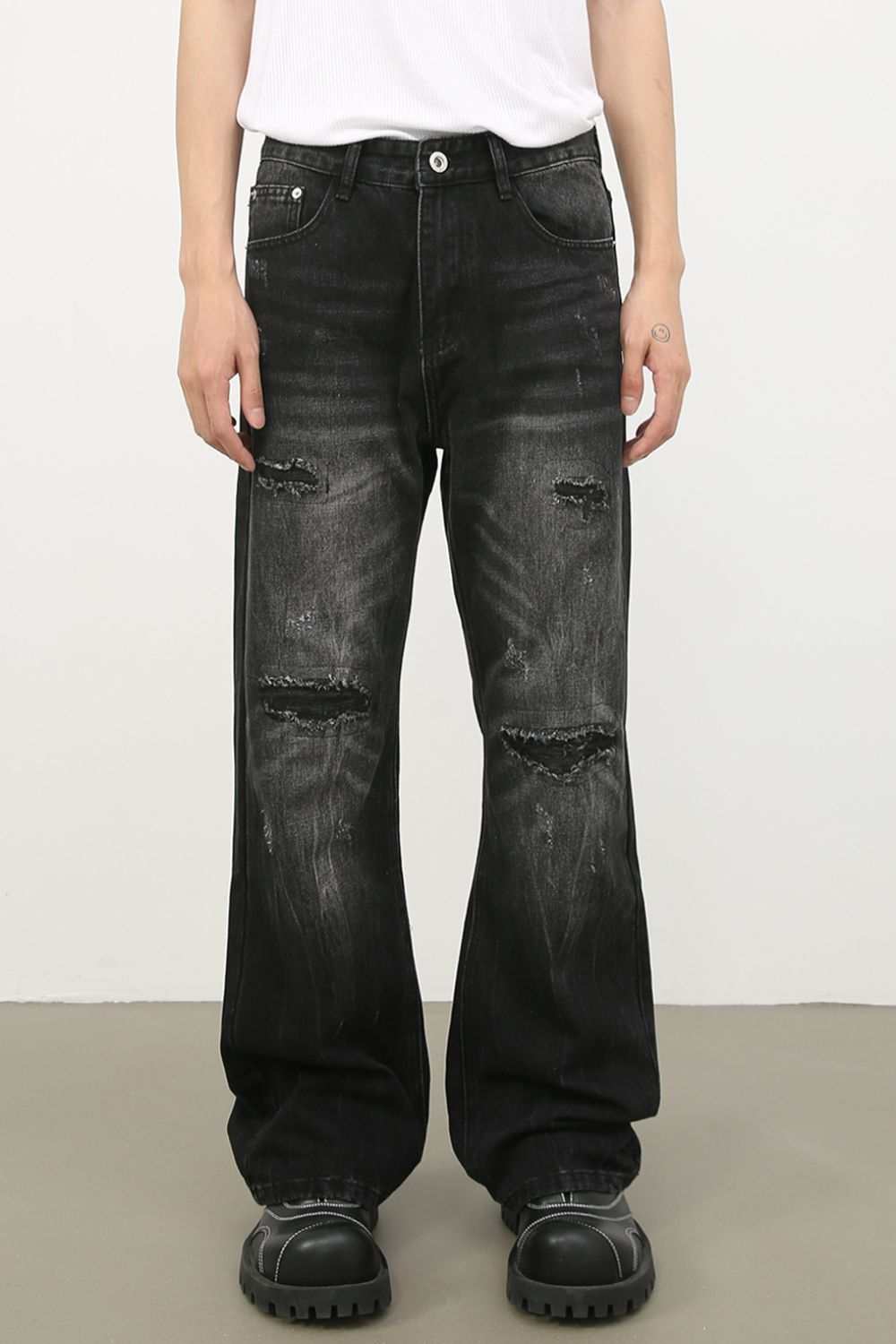 Men's distressed jeans with pockets, black color, basic style, cotton blend.
