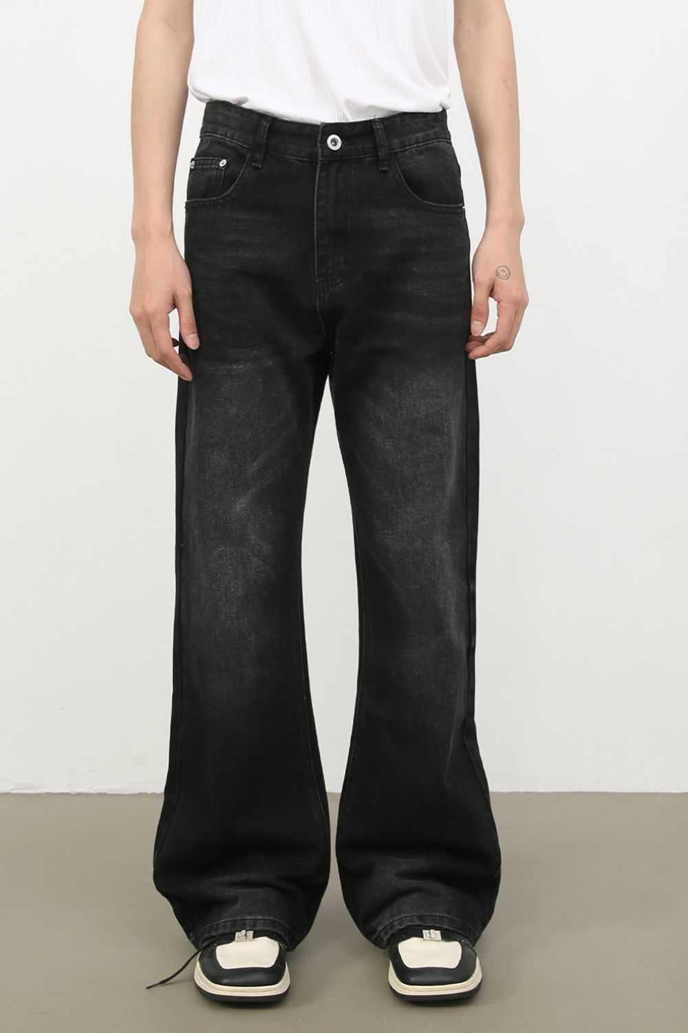 Men's loose fit jeans in dark wash, straight-leg, button-fly, and no stretch.