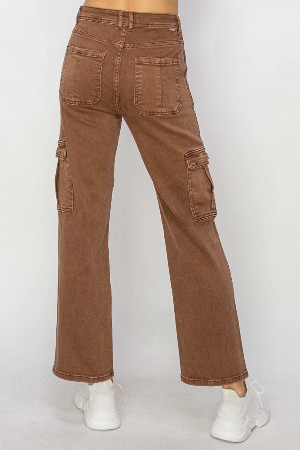 Full-size high-rise cargo jeans with utilitarian pockets in brown, modeled from the back.