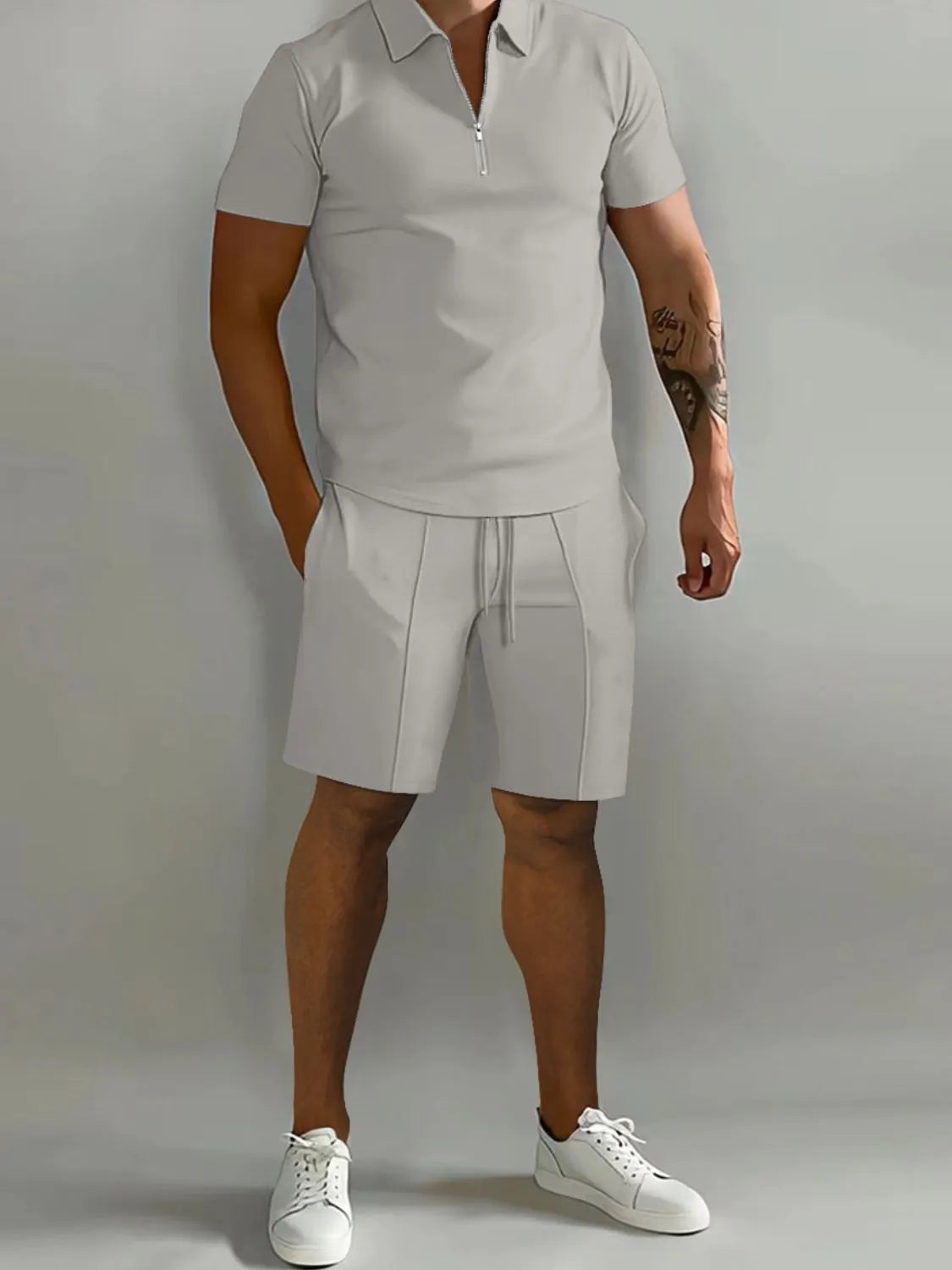 Men's full-size collared neck short sleeve top and shorts set, slightly stretchy, nylon-polyester blend, basic style.