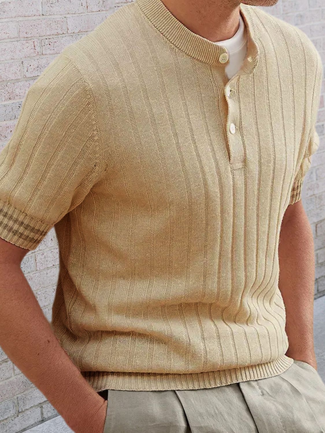 Men's plus size ribbed quarter button round neck polo with striped trim.