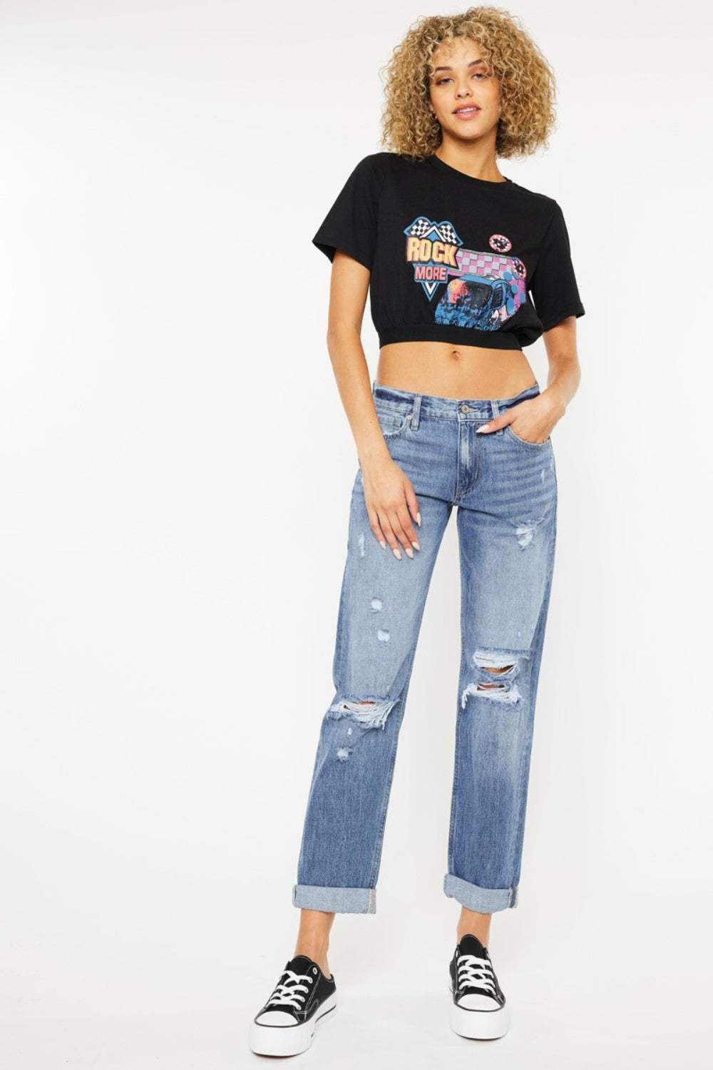 Kancan mid rise distressed straight jeans with urban flair and classic silhouette.