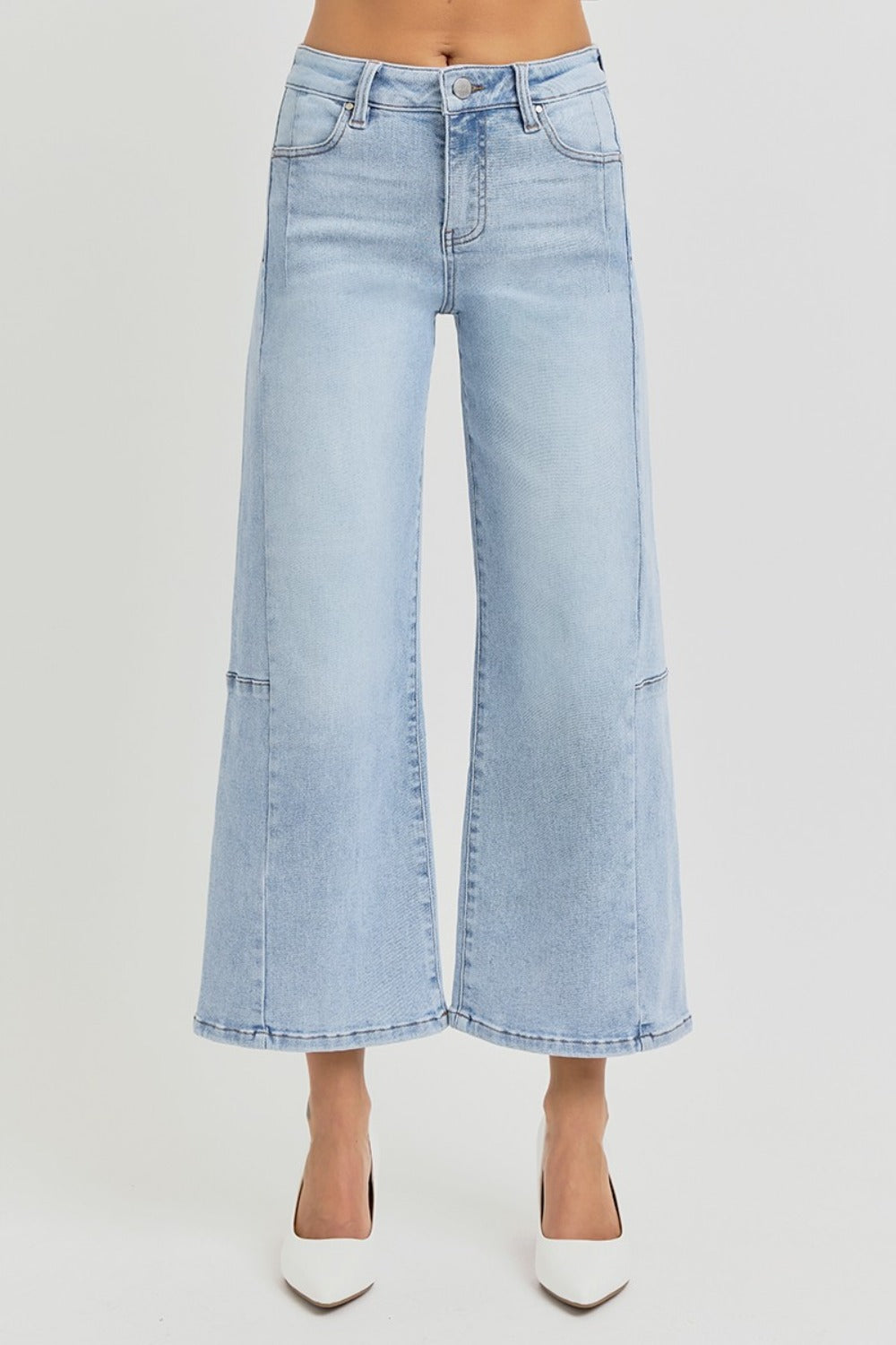 Wide leg crop jeans with high rise and seamed details in light blue denim.