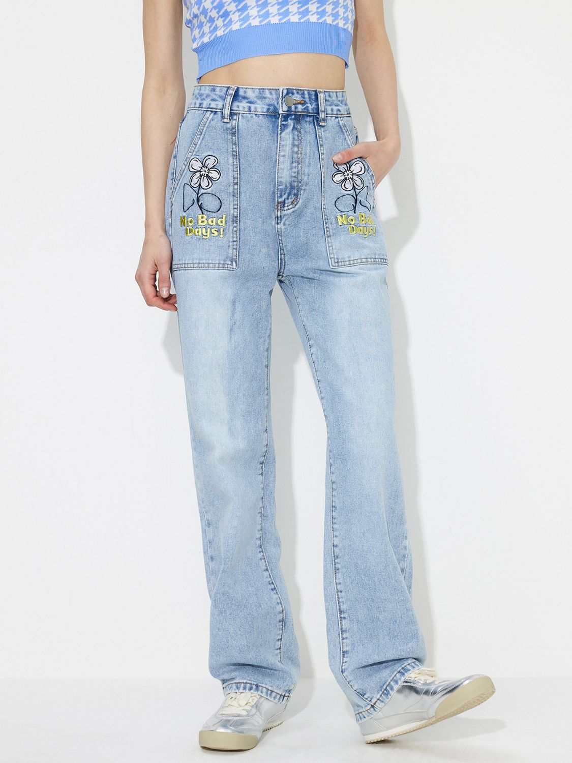 Flower High Rise Straight Leg Jeans with Pockets featuring floral design, no stretch fabric, cotton-polyester blend.