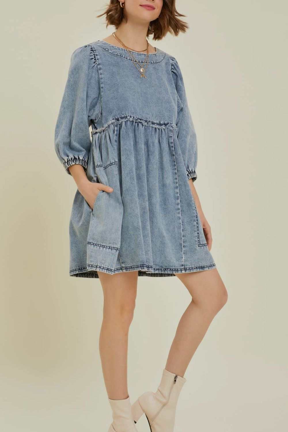 Cutout round neck balloon sleeve denim dress with basic style.