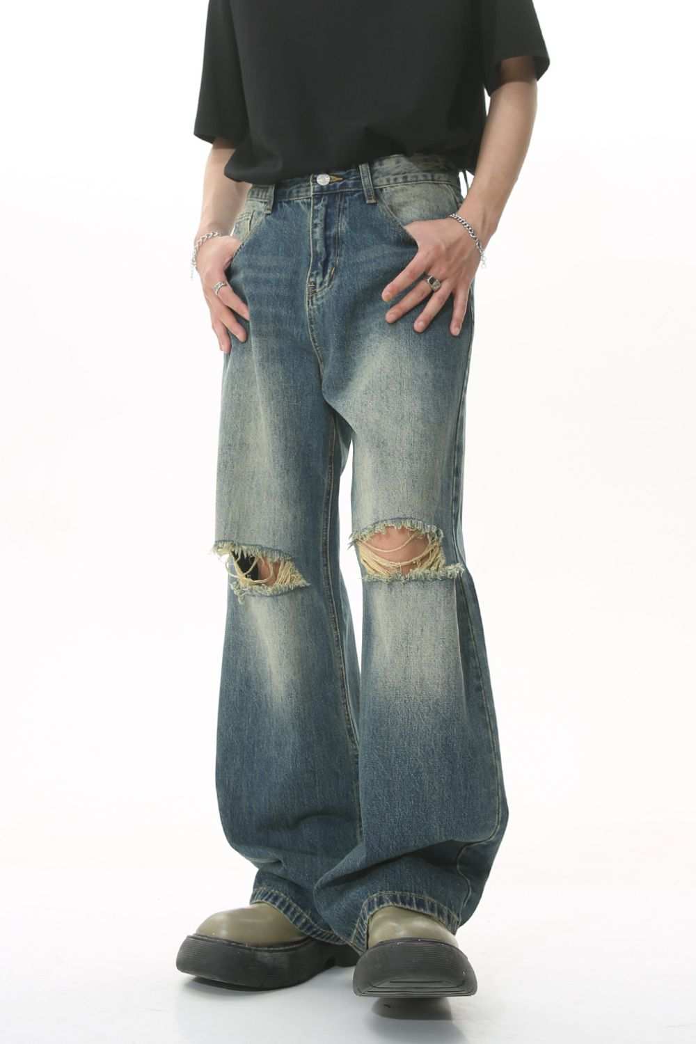 Distressed wide leg men's jeans with ripped knees, no stretch, made of cotton blend.