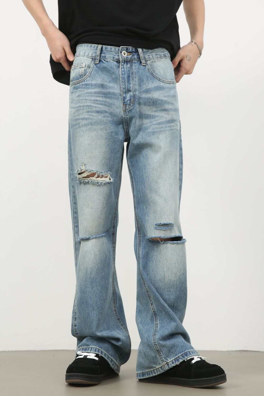 Men's distressed jeans, no stretch, cotton blend, machine washable.