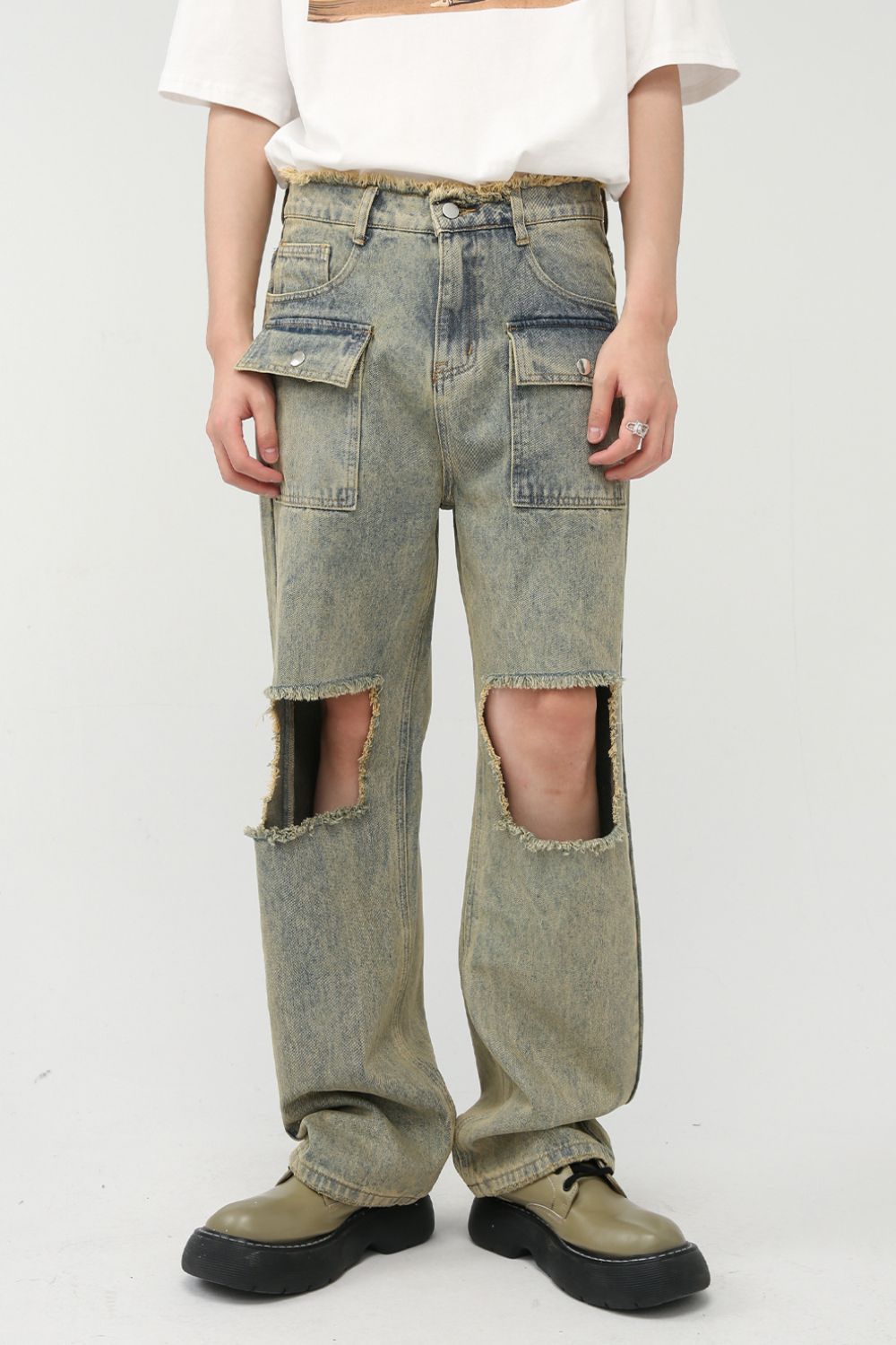Raw Hem Distressed Jeans featuring a trendy, distressed look with a classic fit.