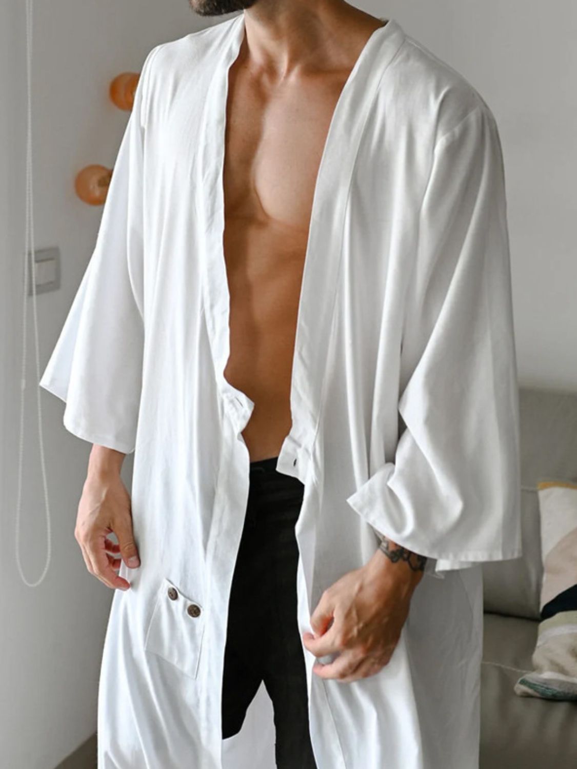 Men's full size button detail long sleeve cover-up in white, made from polyester and cotton blend.