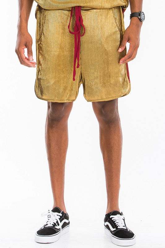 Metallic Flick Shorts with elastic waist and drawstring, side stripe, pockets, made in USA.