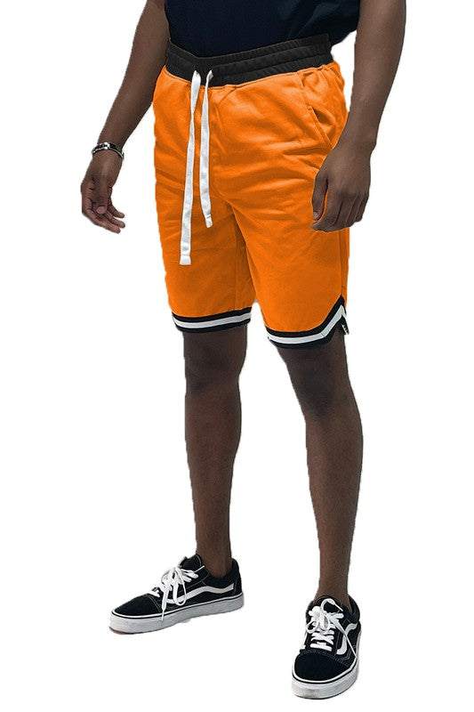 Solid athletic sports shorts with elastic waist, drawstring, and pockets.