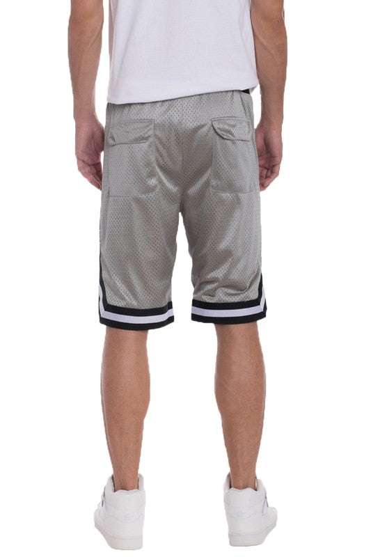Striped band basketball shorts with mesh fabric and zippered pockets.