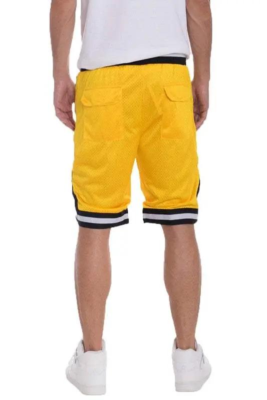 Men's yellow basketball shorts with contrast striped waistband and hemline.