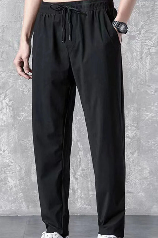 Men's plus size black drawstring pants with pockets, basic style.