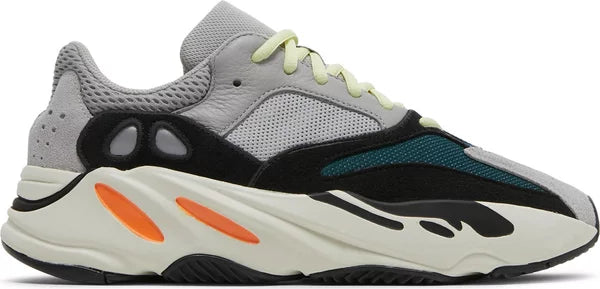 adidas Yeezy Boost 700 Wave Runner sneaker with multi-material upper, teal and blue overlays, vibrant yellow laces, and orange-accented off-white midsole.