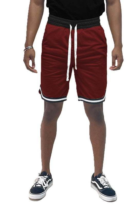 Solid athletic basketball sports shorts with elastic waist and drawstring.