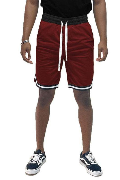 Solid athletic basketball sports shorts with elastic waist and drawstring.