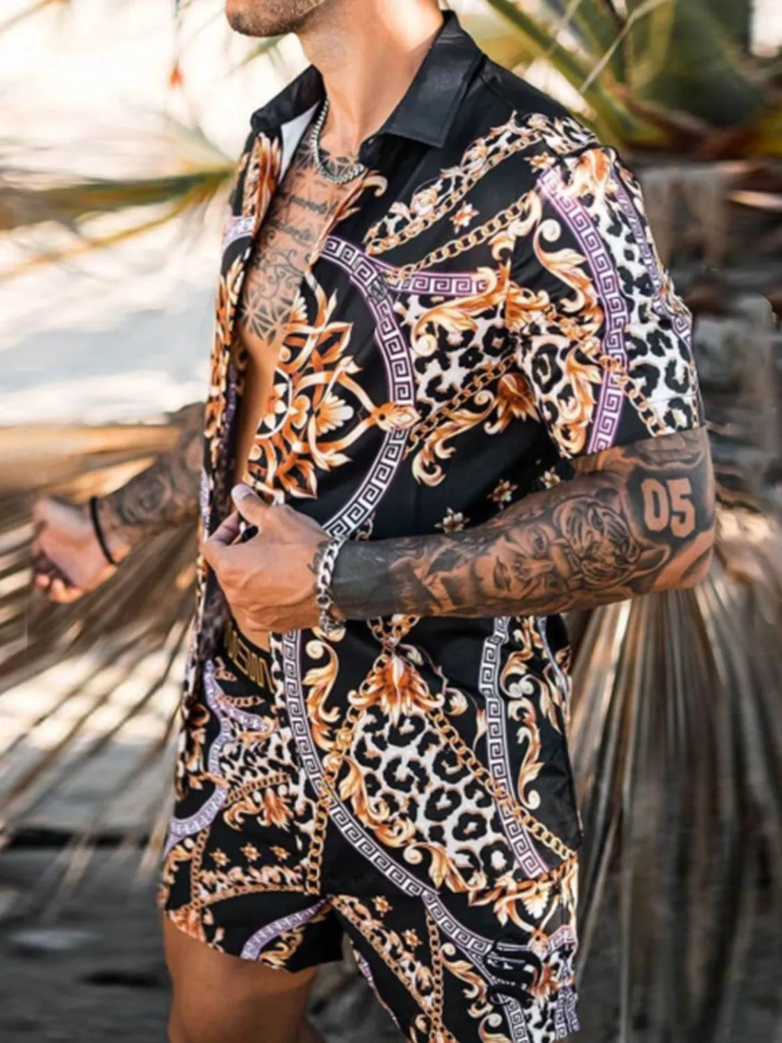 Men's full-size printed short sleeve top and shorts set, featuring a vibrant pattern, slightly stretchy fabric, and polyester-spandex blend.