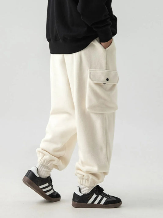 Men's plus size elastic waist joggers with pockets in white, featuring a comfortable fit and basic style.