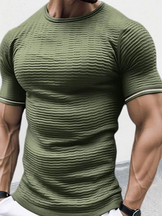 Men's plus size textured round neck green T-shirt with contrast trim.