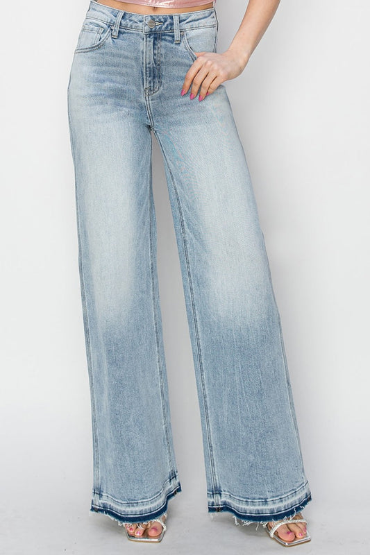Full size high rise wide leg jeans with raw hem and washed denim look.