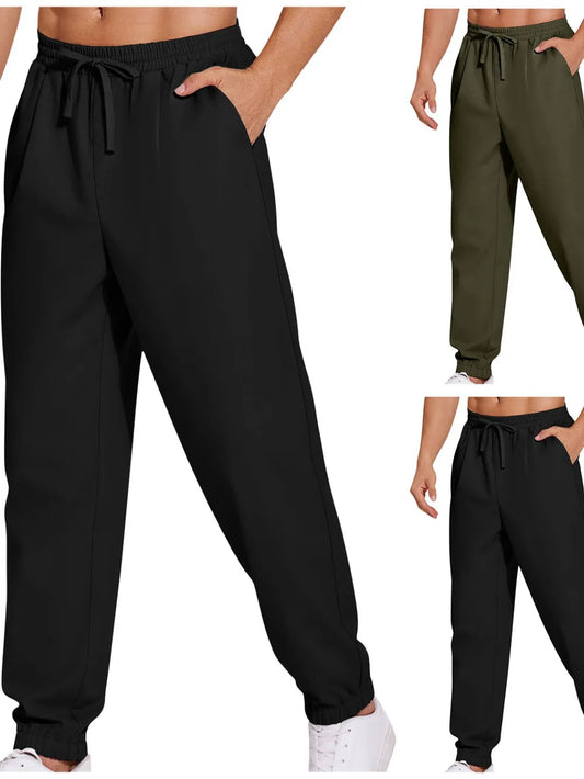 Men's plus size drawstring joggers in black and olive green, 100% polyester.